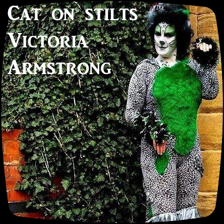 Vicki Armstrong as Cheshire Cat on Stilts from Alice in Wonderland Tyne & Wear
